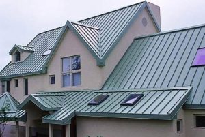 Green metal roof on a two story home